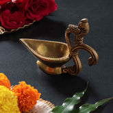 Badaami Diya with Peacock Handle